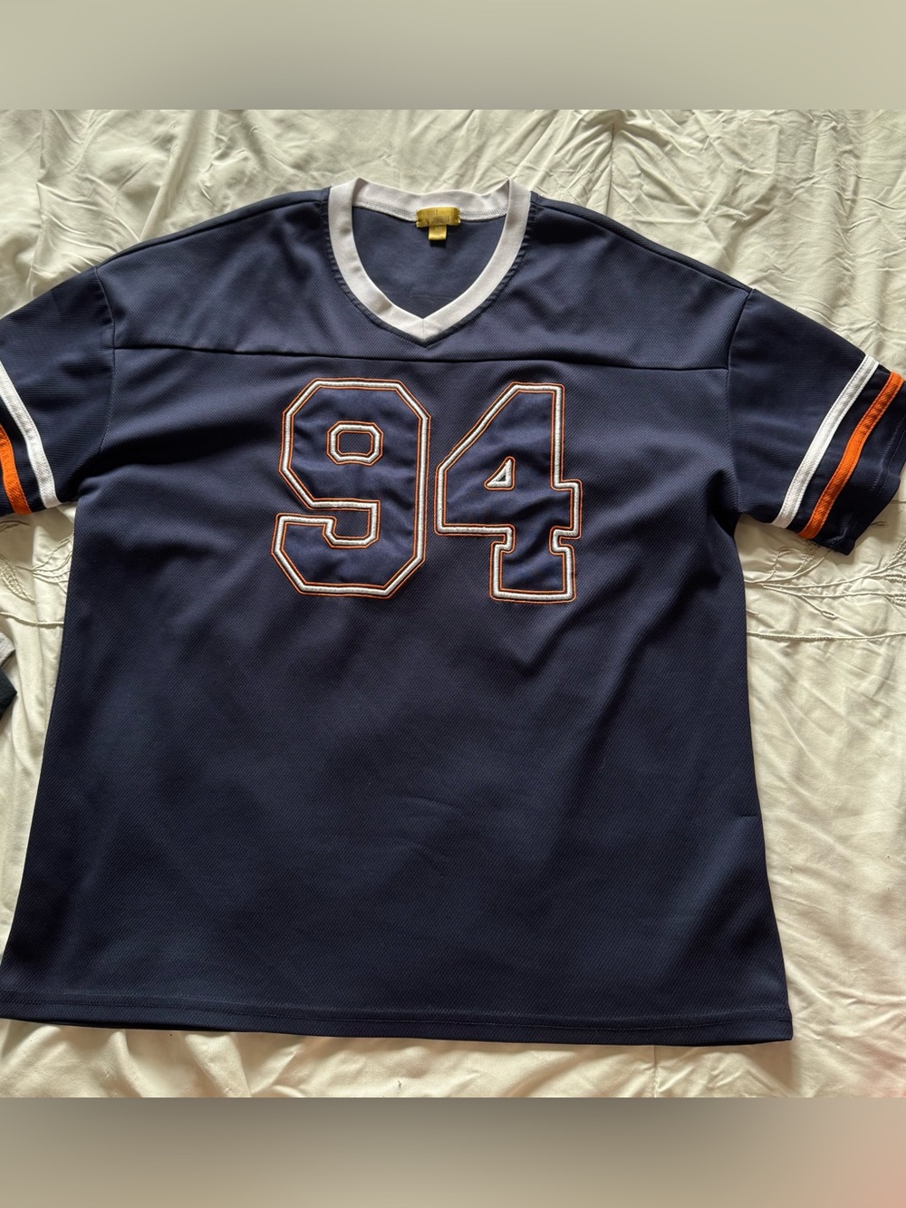 Navy Jersey with White and Orange Accents